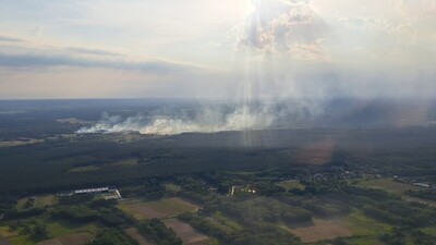 Widok pogorzeliska z śmigłowca Straży Granicznej Widok pogorzeliska z śmigłowca Straży Granicznej