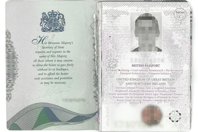 Uszkodzony brytyjski paszport Uszkodzony brytyjski paszport