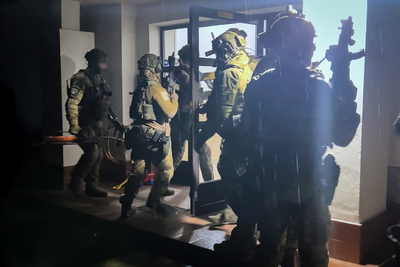 Funkcjonariusze Straży Granicznej podczas wykonywania czynności służbowych Funkcjonariusze Straży Granicznej podczas wykonywania czynności służbowych